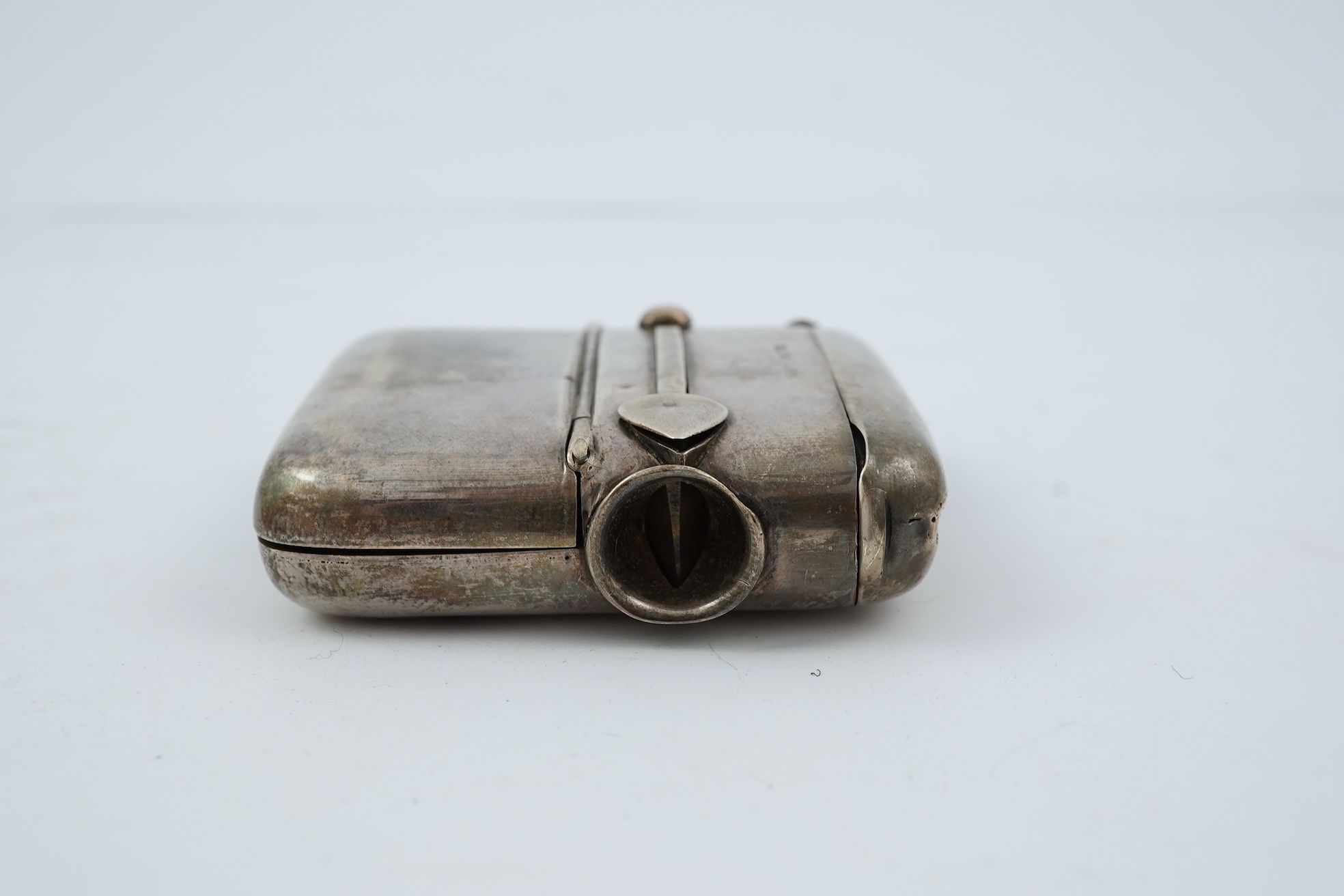 A late Victorian silver combination, cigar cutter, sovereign/half sovereign and vesta case by William Hair Haseler
